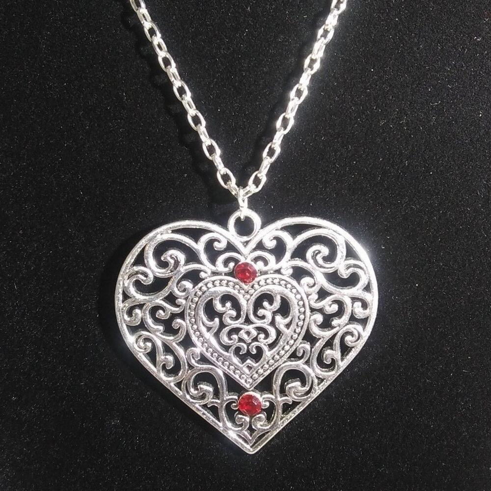 Silvertone Large Heart Shaped Pendant with Red Crystals Necklace Filigree Design